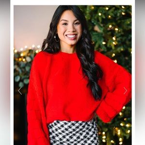 Red sweater with larger/flowy sleeves